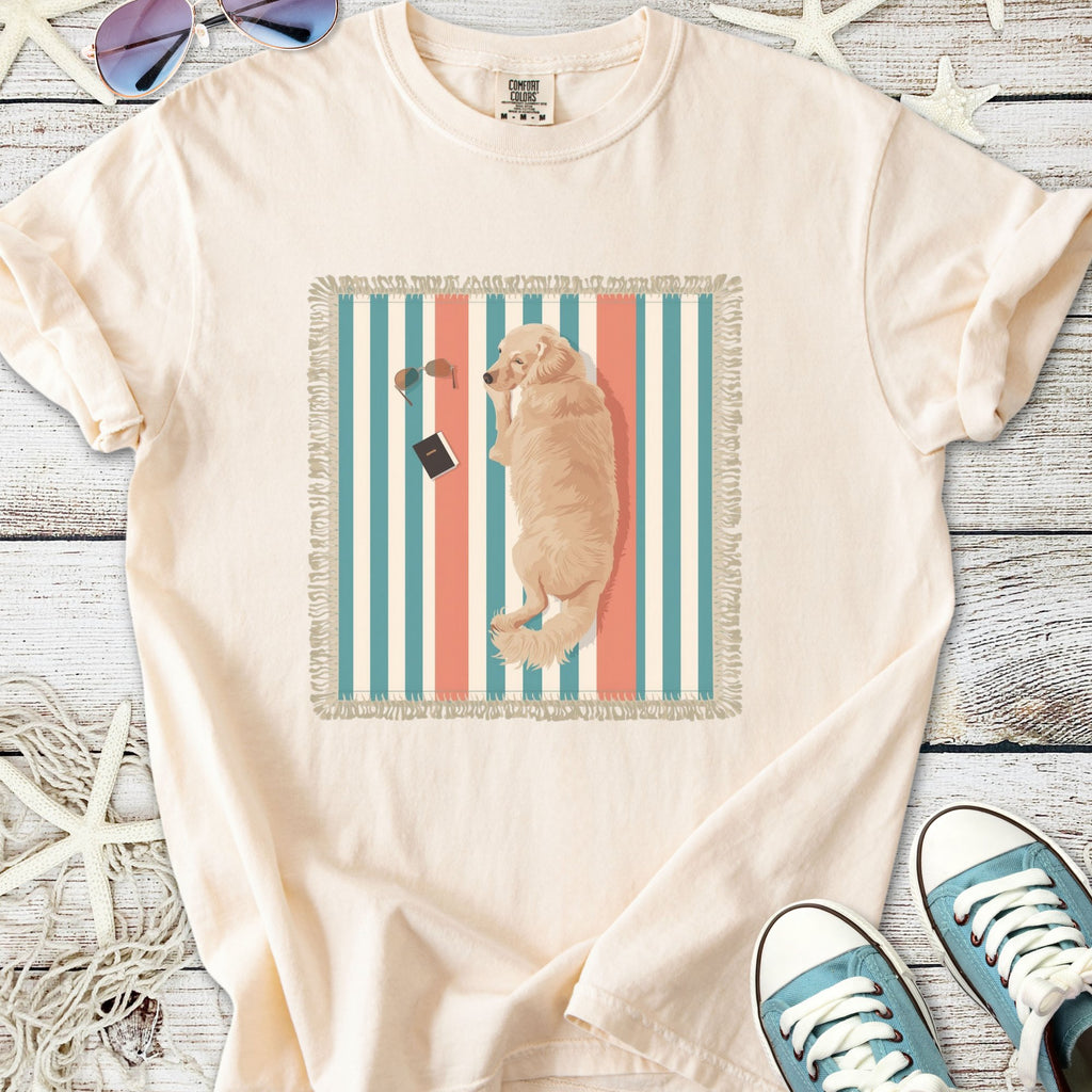Beige graphic t-shirt featuring a dog print, perfect for casual wear and dog lovers.