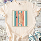 Beige graphic t-shirt featuring a dog print, perfect for casual wear and dog lovers.