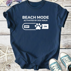 Navy blue t-shirt with 'Beach Mode Activated by Dog Walk' graphic and paw print design.