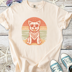 Cream cotton t-shirt featuring a dog in sunglasses and bandana, perfect for casual summer wear.