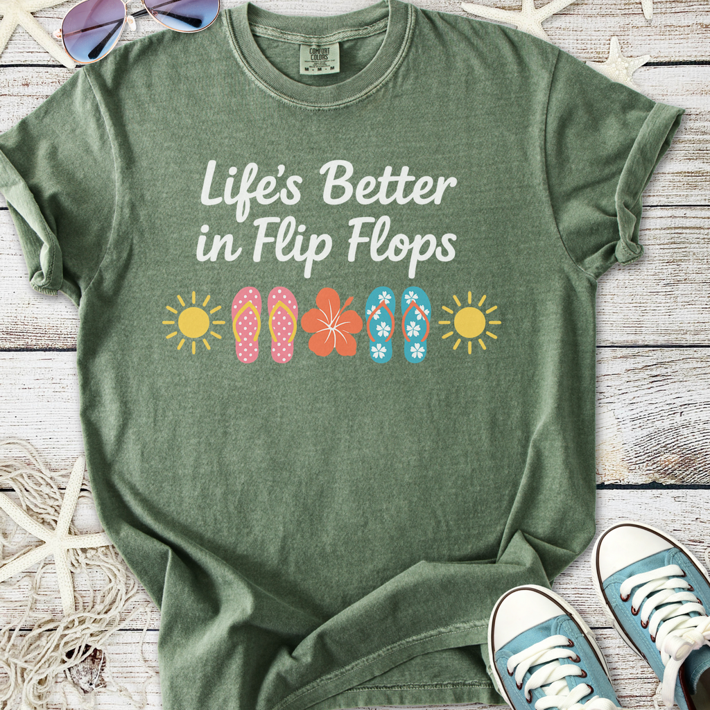 Green graphic tee with 'Life's Better in Flip Flops' design and colorful flip flop illustrations.