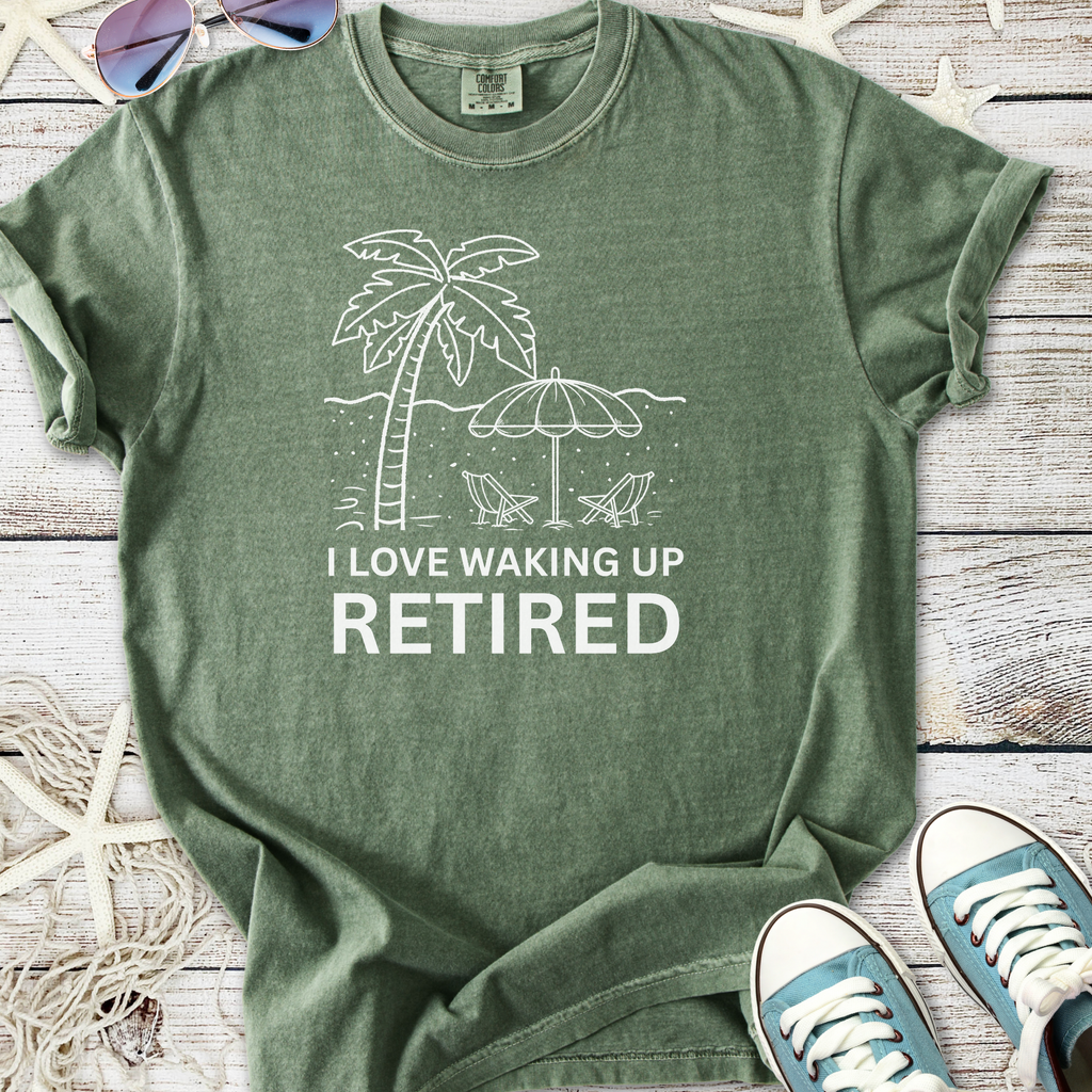 Green retired theme t-shirt with palm tree graphic and text 'I Love Waking Up Retired', casual cotton material.