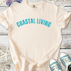 Beige cotton t-shirt with 'Coastal Living' print in teal, perfect for casual beachwear.