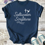 Navy blue graphic tee featuring 'Saltwater & Scripture' design, perfect for beach lovers and faith enthusiasts.