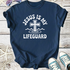 Navy blue cotton t-shirt featuring 'Jesus Is My Lifeguard' graphic with cross and waves design.