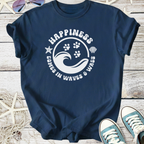 Navy blue t-shirt with 'Happiness Comes in Waves & Wags' graphic, featuring paw prints and ocean waves.