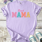 Lavender Beach Mama graphic t-shirt, soft material with colorful letter prints, perfect for summer outings.