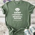 Green cotton t-shirt featuring 'Chief Stick Retrieval Officer' graphic, perfect for dog lovers.