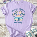 Lavender t-shirt featuring beach and dog graphic, perfect for dog lovers and beach enthusiasts.