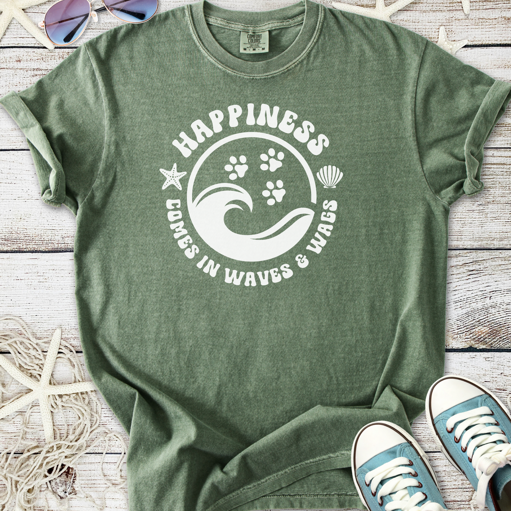 Olive green t-shirt with 'Happiness Comes in Waves & Wags' graphic, featuring ocean and paw print design.