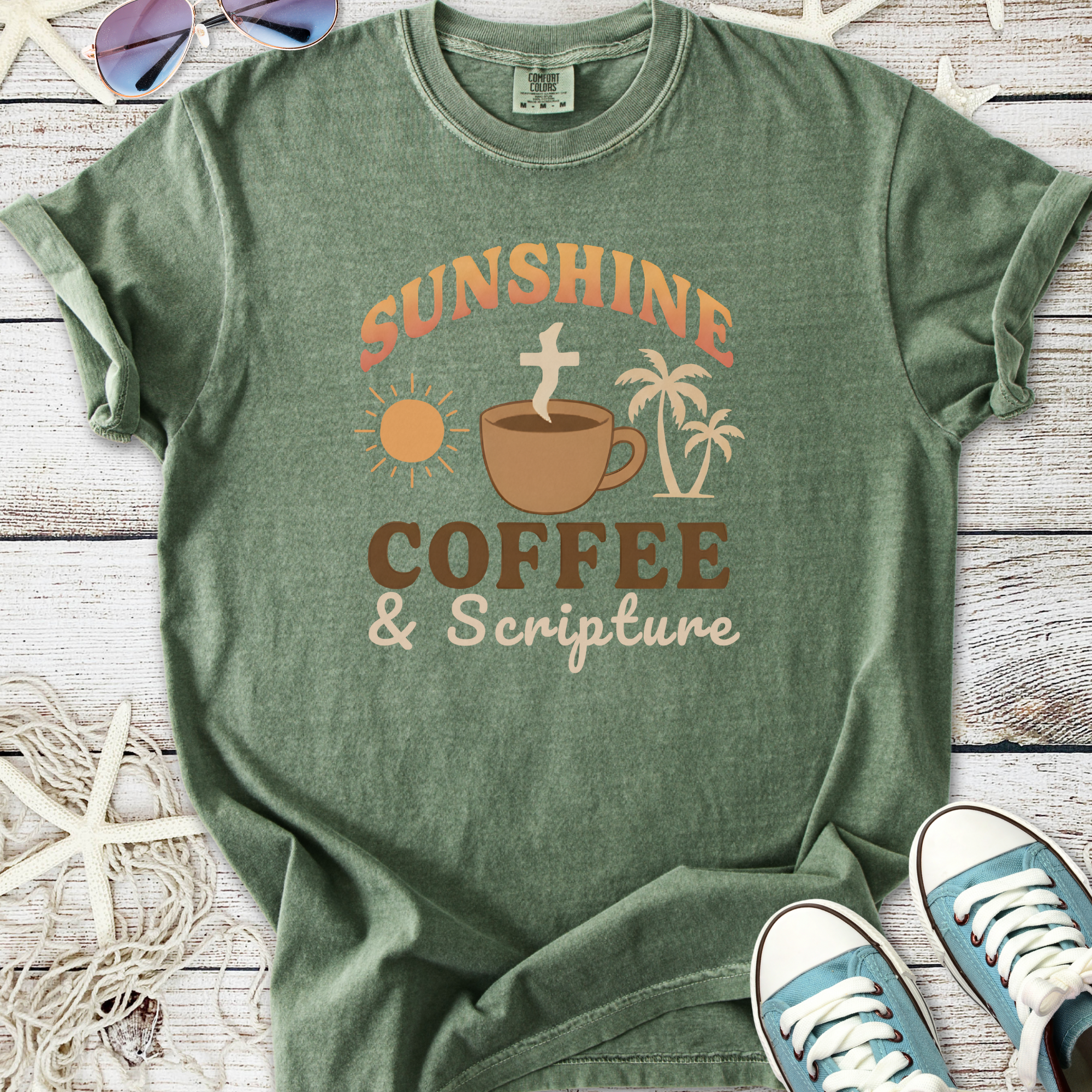 Green cotton t-shirt with 'Sunshine Coffee & Scripture' graphic, perfect for casual wear.