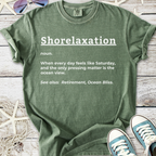 Green cotton t-shirt with 'Shorelaxation' graphic for beach lovers, ideal for casual wear.