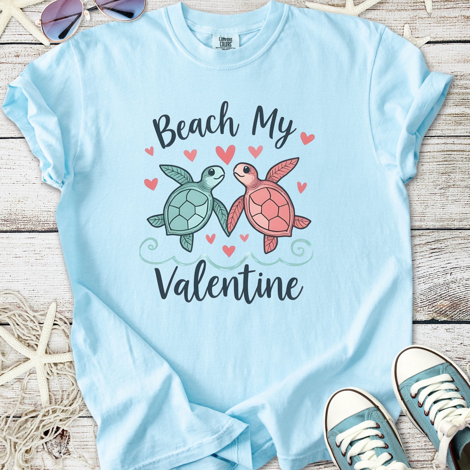 Light blue t-shirt with cute sea turtles and 'Beach My Valentine' design, perfect for Valentine's Day.