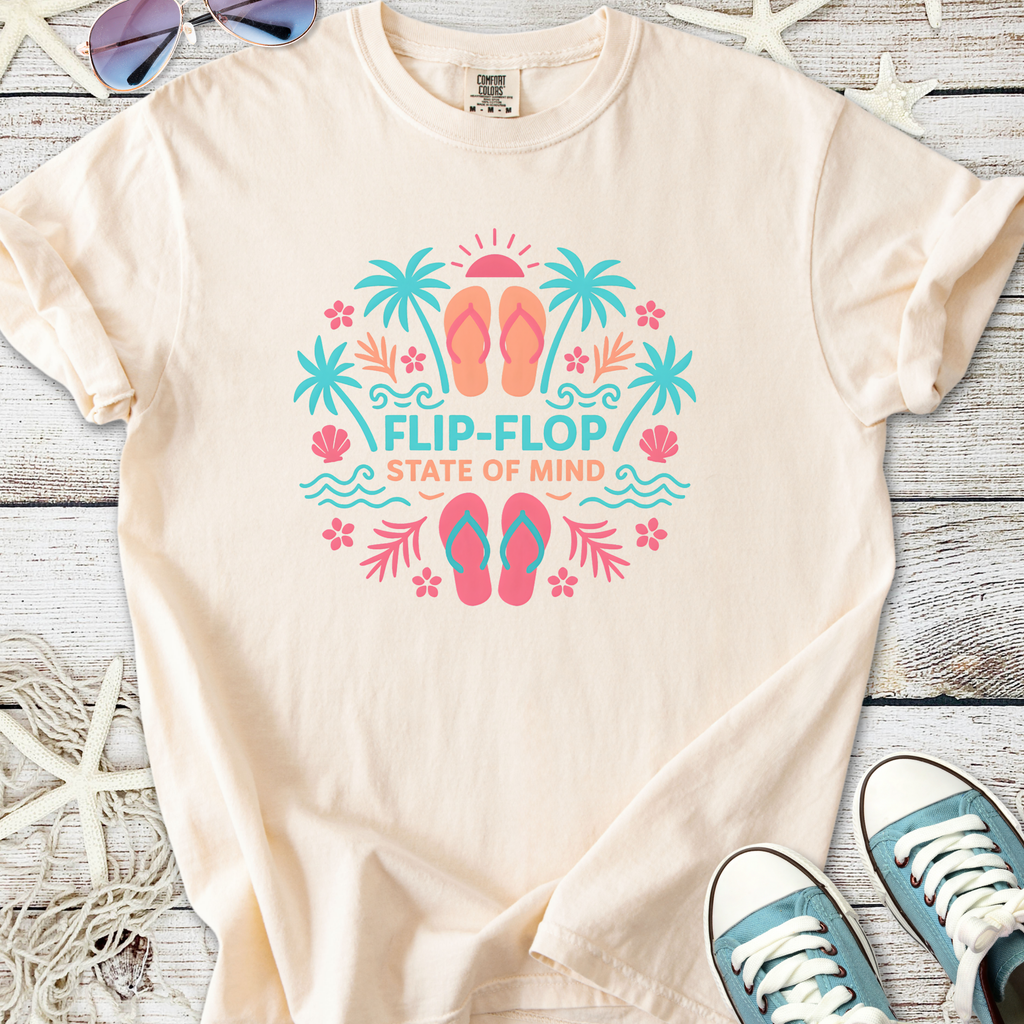 Cream t-shirt with 'Flip-Flop State of Mind' graphic, colorful palm trees and flip-flops design.
