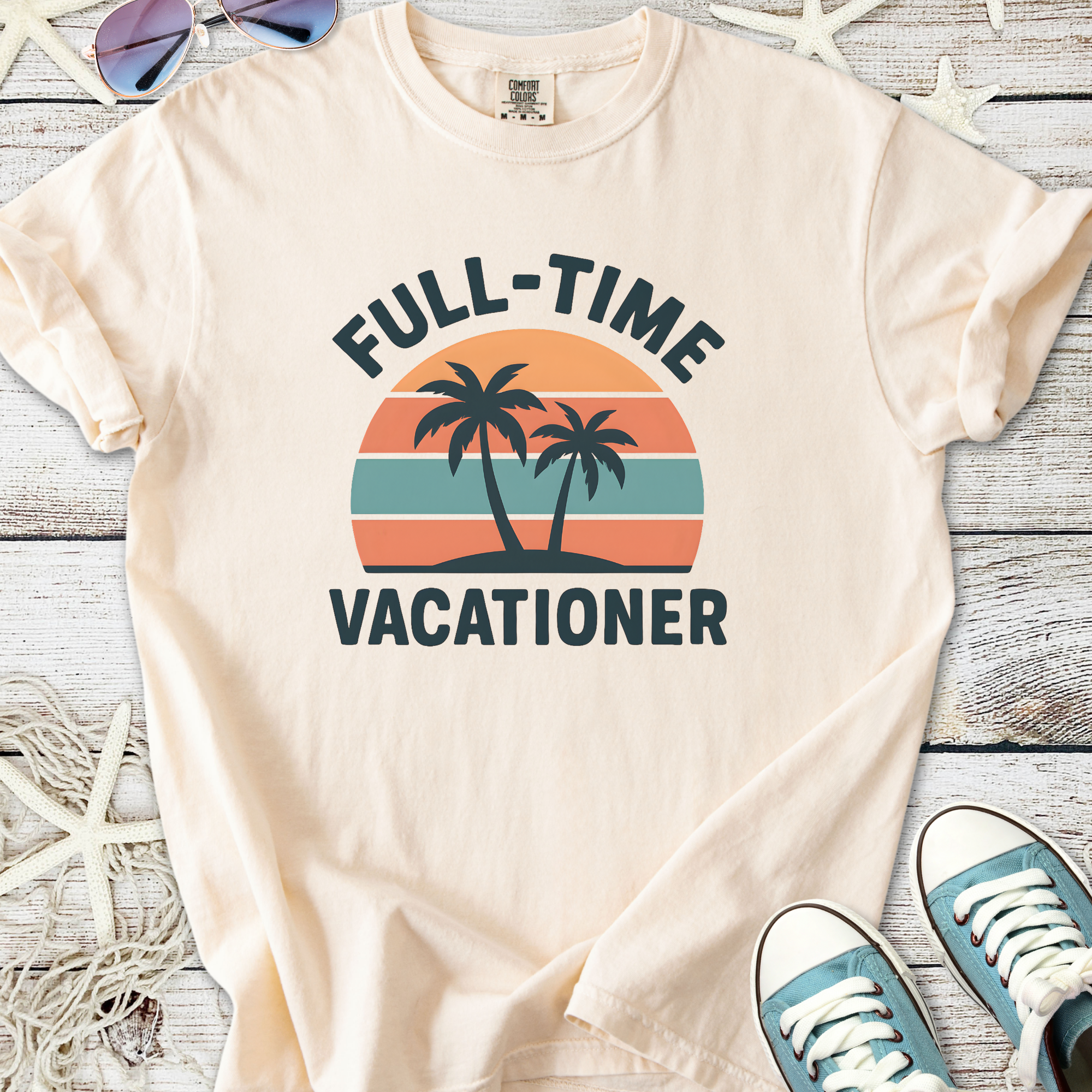 Beige t-shirt with 'Full-Time Vacationer' graphic and palm trees, perfect for summer wear.
