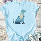 Light blue t-shirt featuring a dog silhouette with ocean waves and sun design, perfect for pet lovers.