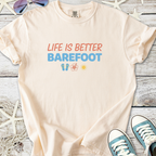 Light peach t-shirt with 'Life is Better Barefoot' print, made of soft cotton, perfect for summer outings.