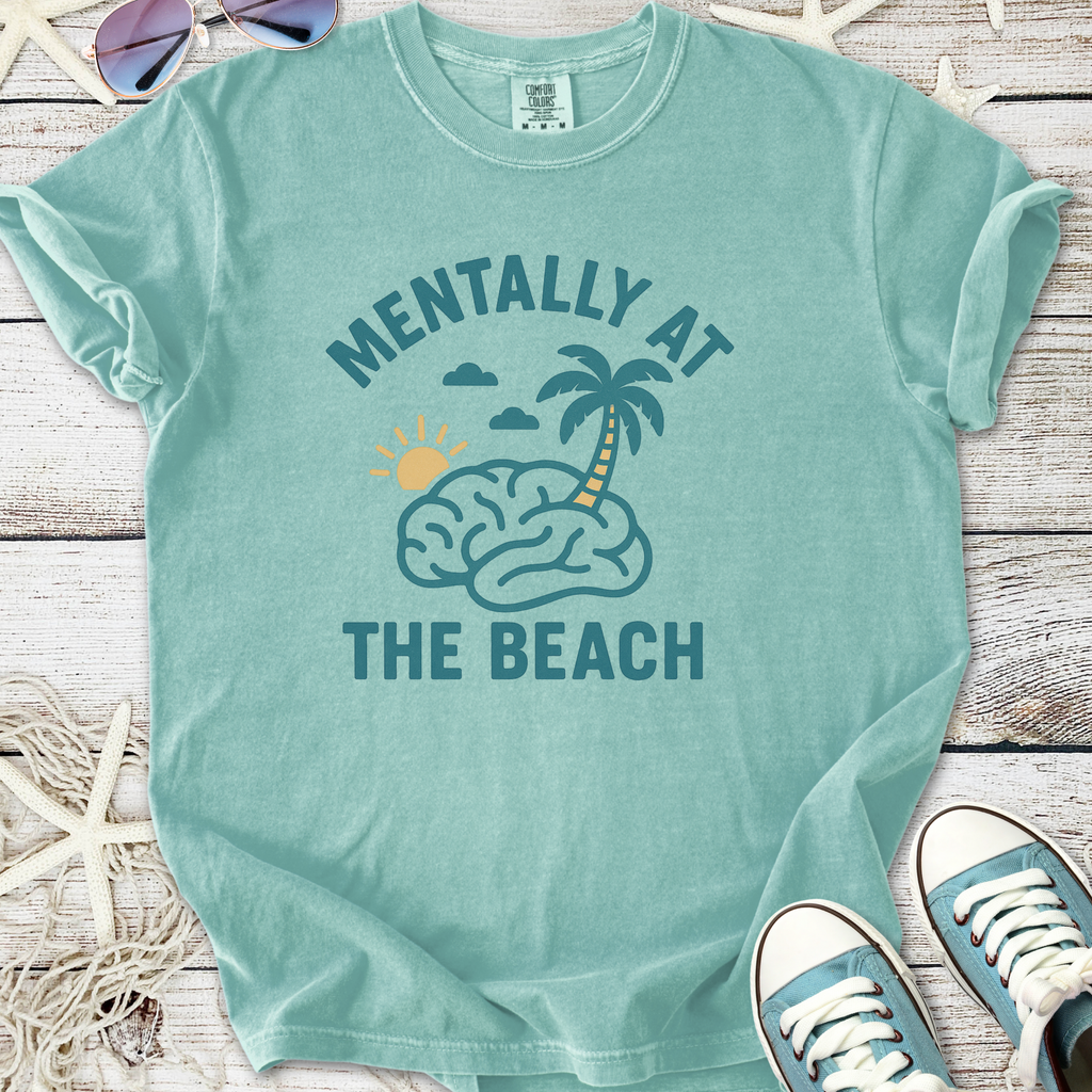 Mint green t-shirt with 'Mentally at the Beach' graphic, featuring brain, sun, and palm tree design.