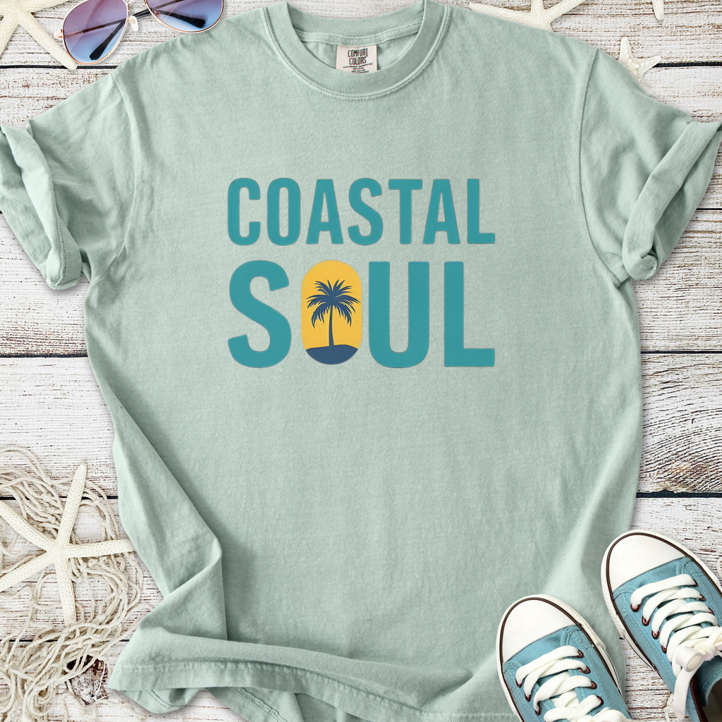 Mint green Coastal Soul t-shirt featuring palm tree design, perfect for beach lovers.