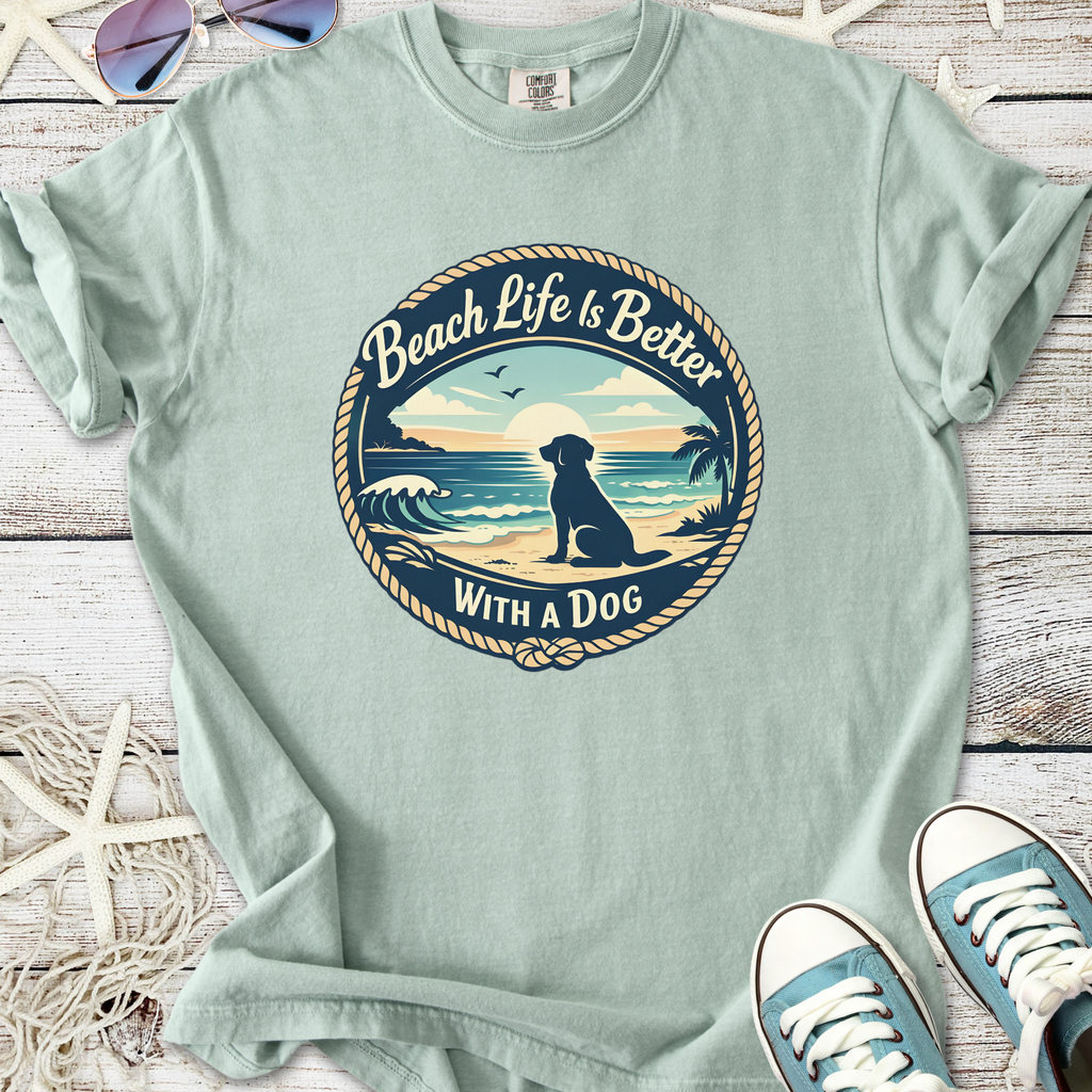 Light blue graphic tee featuring 'Beach Life Is Better With a Dog' design, perfect for pet lovers.