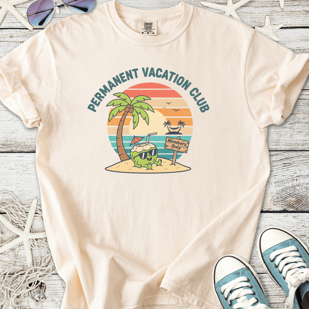Cream t-shirt featuring 'Permanent Vacation Club' graphic with a tropical design and palm trees.