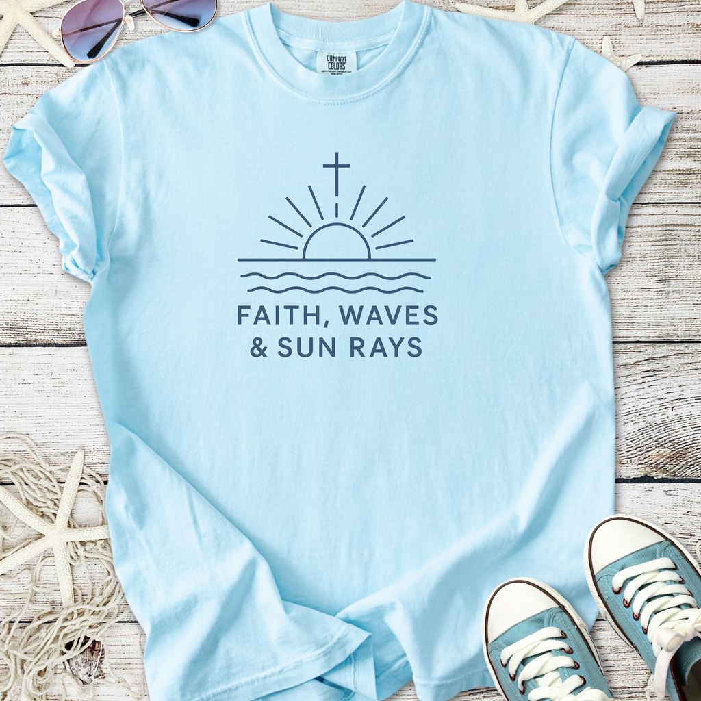 Light blue t-shirt with 'Faith, Waves & Sun Rays' graphic, casual summer style, made of soft cotton.