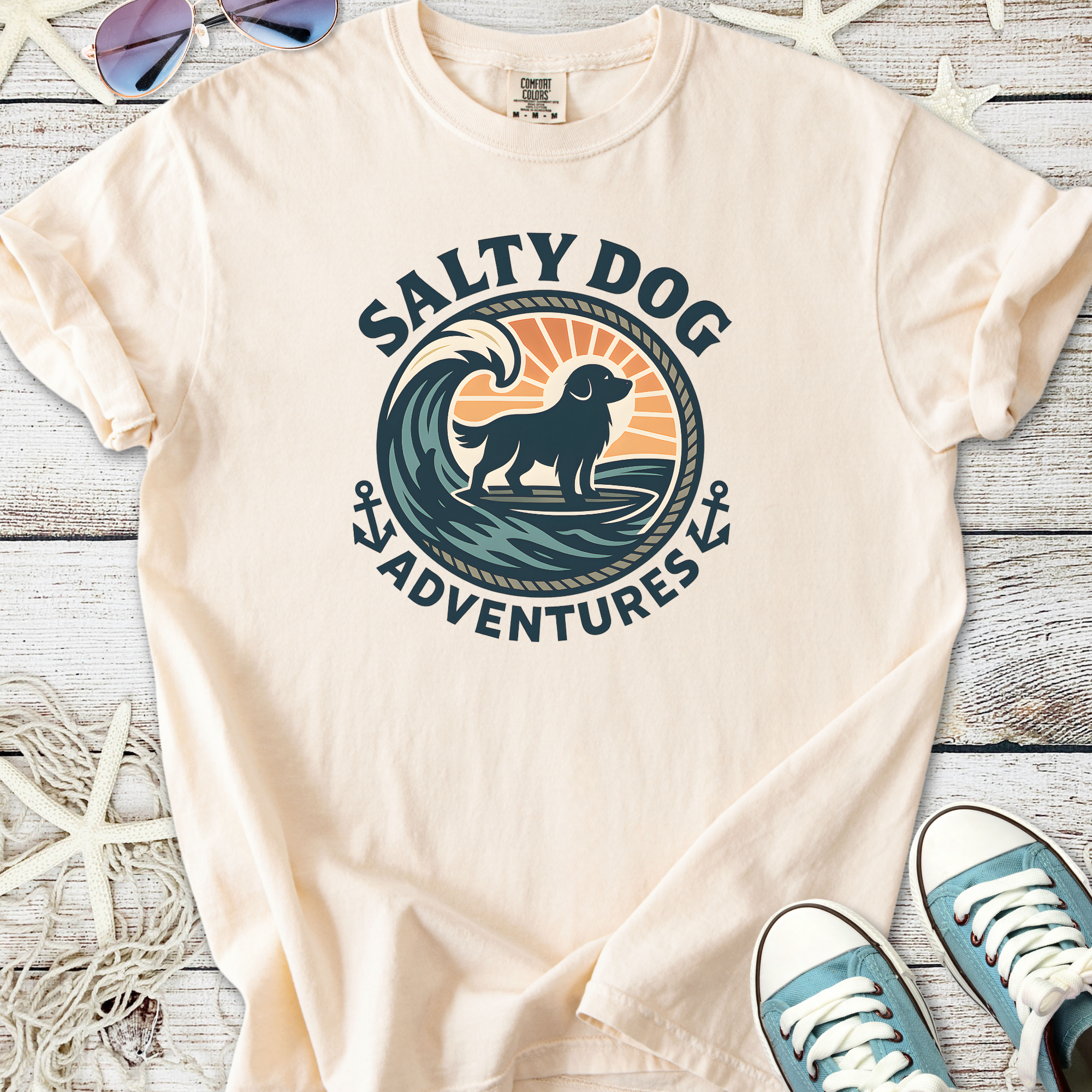 Cream t-shirt with 'Salty Dog Adventures' graphic featuring a dog and wave design.