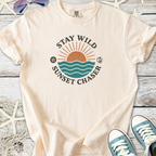 Cream cotton t-shirt with 'Stay Wild Sunset Chaser' graphic and ocean design, perfect for beach lovers.