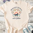 Beige tee shirt featuring a fun beach-themed graphic with a golden retriever silhouette and playful designs.