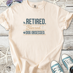Cream t-shirt with 'Retired. Blessed. Dog Obsessed.' graphic print, ideal for dog lovers.