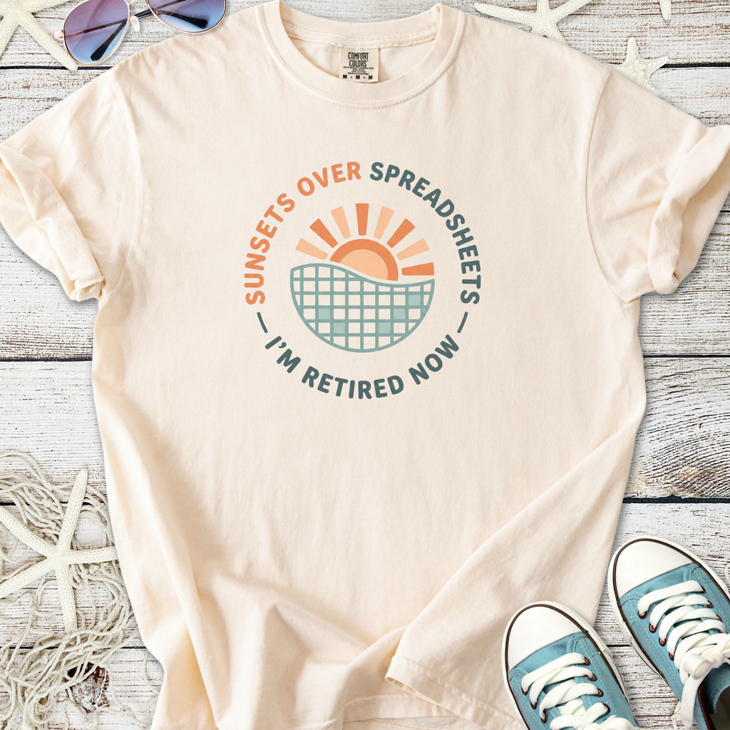 Cream cotton t-shirt with 'Sunsets Over Spreadsheets' graphic, perfect for retirees.