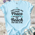 Light blue t-shirt with 'There's a girl who chose Peace and moved to the Beach' text design.