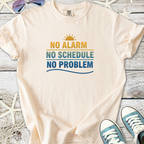 Cream cotton t-shirt with fun beachy print: 'No Alarm, No Schedule, No Problem' for casual summer wear.