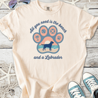 Cream cotton t-shirt with beach and Labrador graphic, perfect for dog lovers and casual wear.
