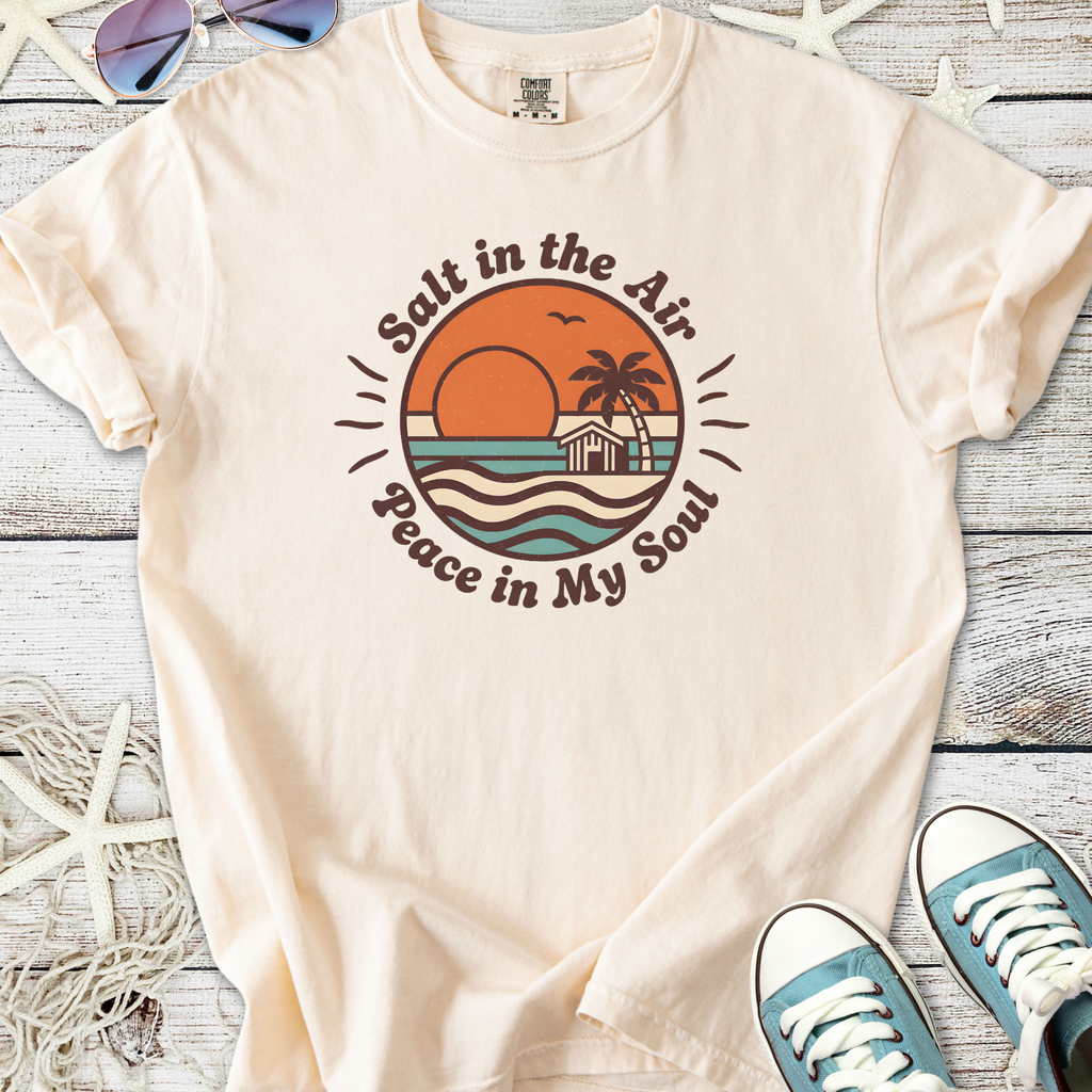 Beige cotton t-shirt with 'Salt in the Air, Peace in My Soul' graphic and beach sunset design.