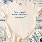 Cream cotton t-shirt with 'Beach Mode: Permanently On' print and wave design, perfect for summer wear.