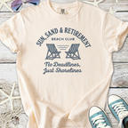 Light peach t-shirt featuring beach club graphic, chill vibes, comfortable cotton material.