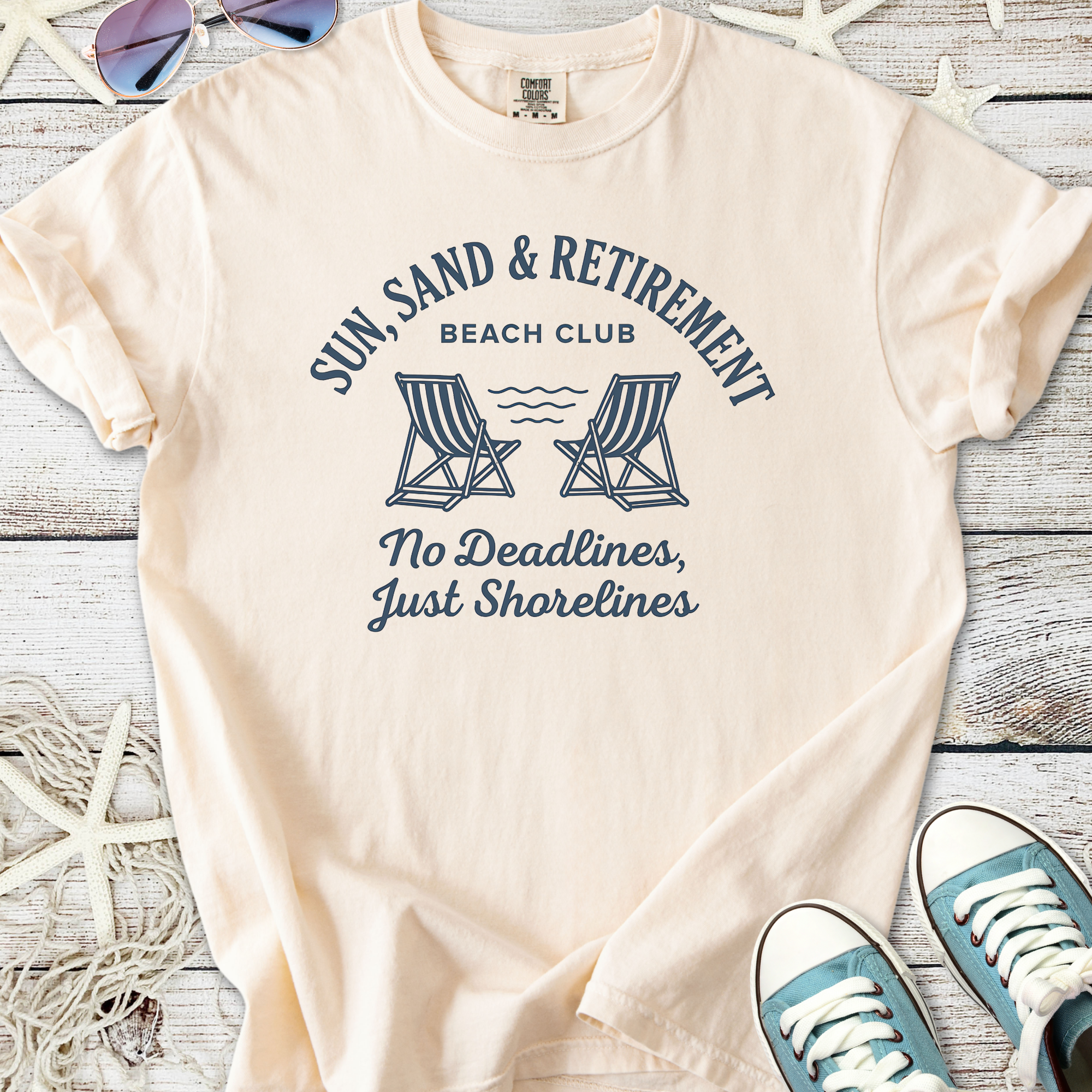Light peach t-shirt featuring beach club graphic, chill vibes, comfortable cotton material.