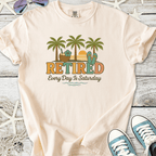 Light peach retired graphic tee with palm trees, flip flops, and beach elements for relaxed summer vibes.