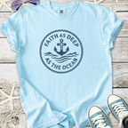 Light blue t-shirt with anchor design and 'Faith as Deep as the Ocean' text, made from soft cotton.
