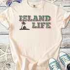 Cream t-shirt with 'Island Life' graphic, featuring palm tree and house illustration, casual summer style.