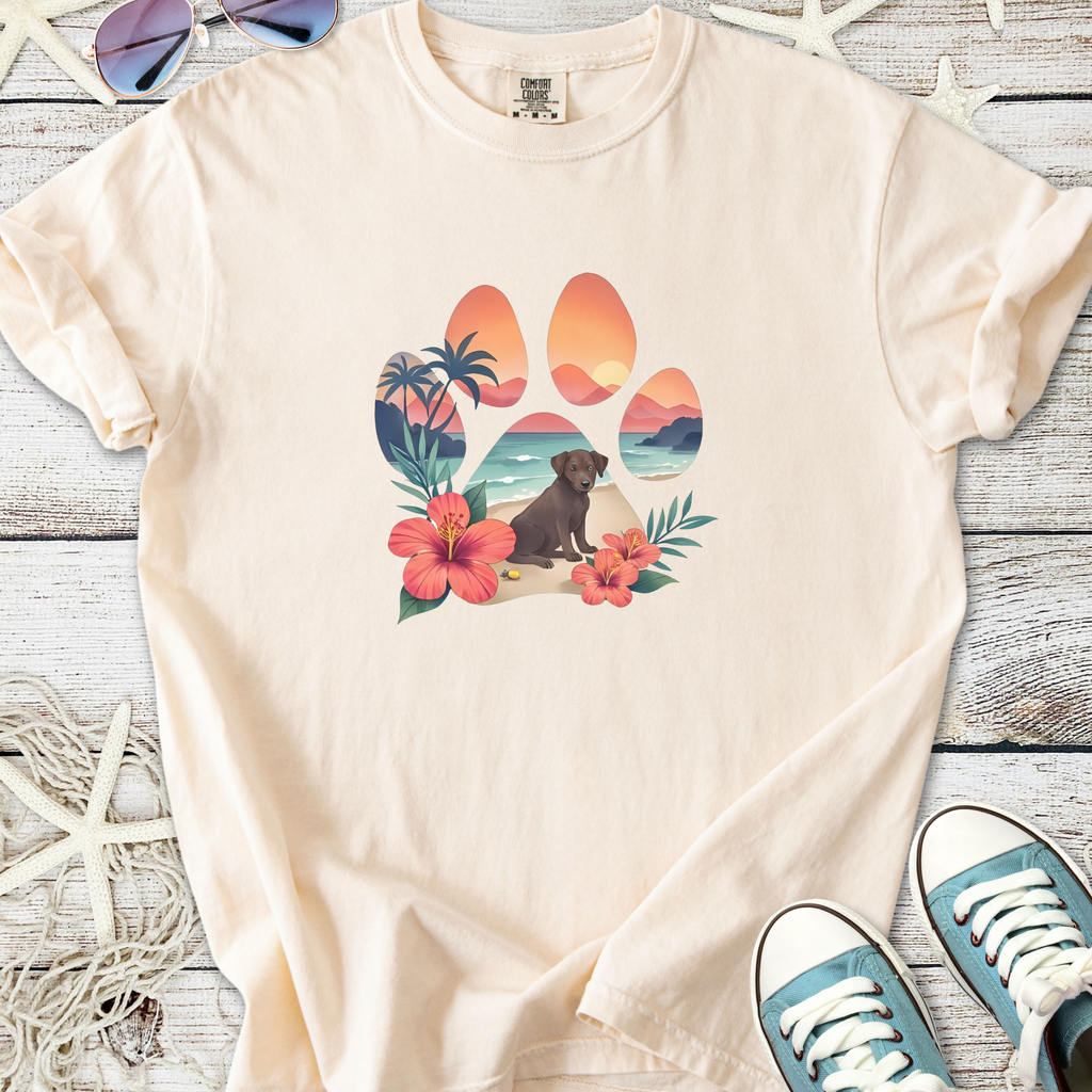 Beige t-shirt featuring a tropical paw print design with a dog and flowers.