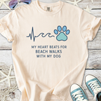 Peach cotton t-shirt with 'My Heart Beats for Beach Walks with My Dog' graphic and paw print design.
