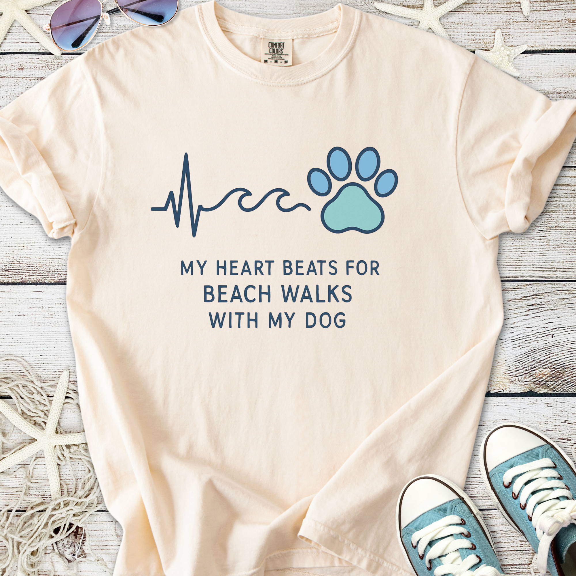 Peach cotton t-shirt with 'My Heart Beats for Beach Walks with My Dog' graphic and paw print design.