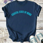 Navy blue t-shirt with 'Coastal State of Mind' graphic, perfect for casual beachwear.