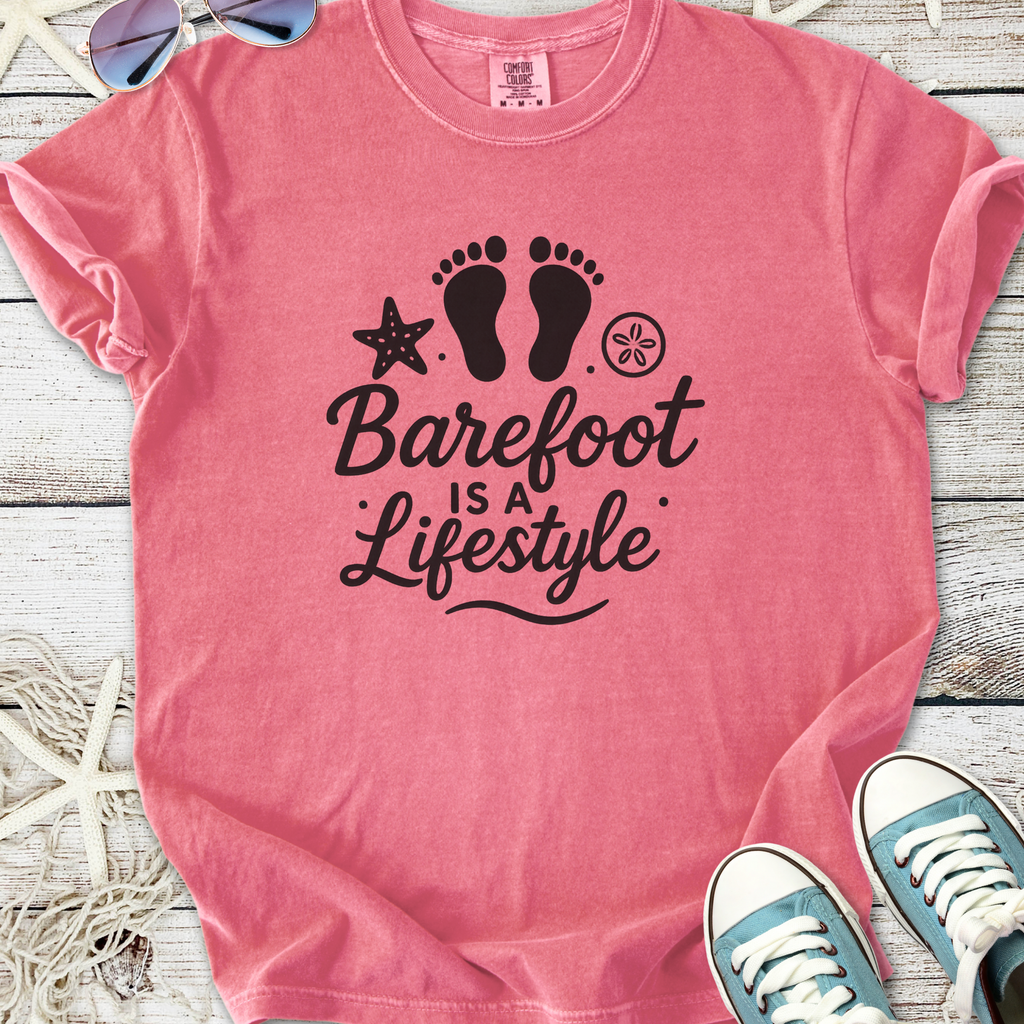Pink cotton t-shirt with 'Barefoot is a Lifestyle' graphic design, perfect for casual summer wear.