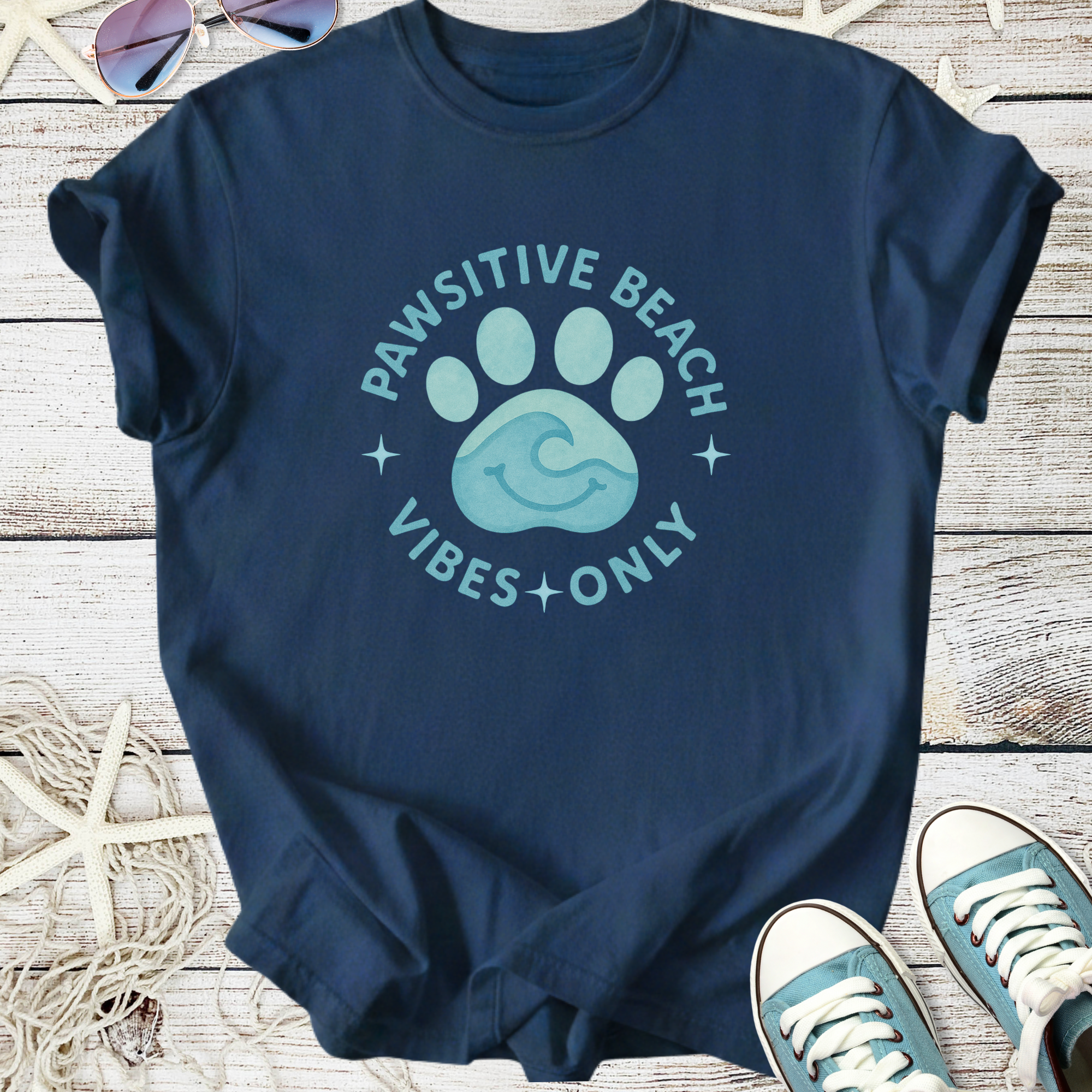 Navy blue graphic tee with 'Pawsitive Beach Vibes Only' and paw print design, perfect for summer outings.