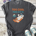 Charcoal gray t-shirt featuring a cool duck graphic and 'Too Cool for a 9 to 5' text, perfect for casual wear.