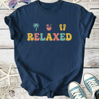 Navy blue relaxed graphic t-shirt with palm tree, drink, and flip-flops design for casual wear.